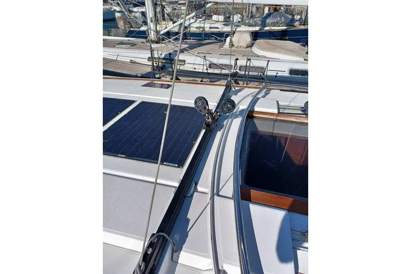 Fiesta Yacht Photos Pics 2019 Jeanneau Sun Odyssey 519 sailboat deck with solar panels and rigging.