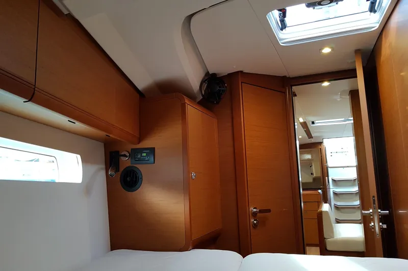 Fiesta Yacht Photos Pics Interior of 2019 Jeanneau Sun Odyssey 519 yacht, featuring wood finish and modern design.