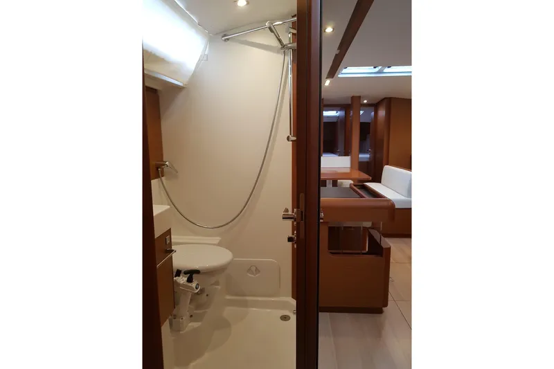 Fiesta Yacht Photos Pics 2019 Jeanneau Sun Odyssey 519 yacht interior with modern bathroom and living area.
