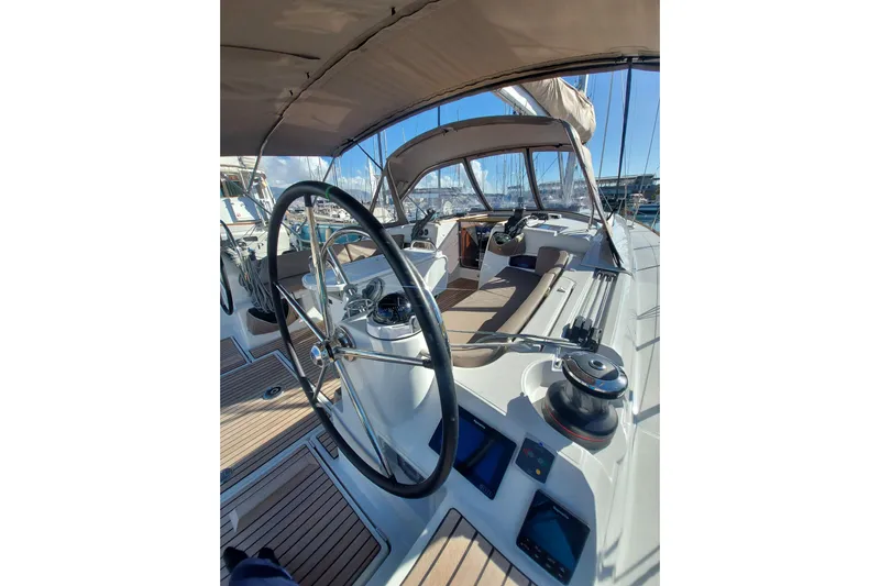 Fiesta Yacht Photos Pics 2019 Jeanneau Sun Odyssey 519 yacht cockpit with dual steering wheels and navigation instruments.