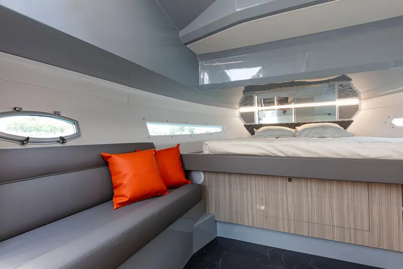  Yacht Photos Pics Luxurious interior of 2024 Rio Yachts Daytona 35 with modern design and vibrant orange accents.