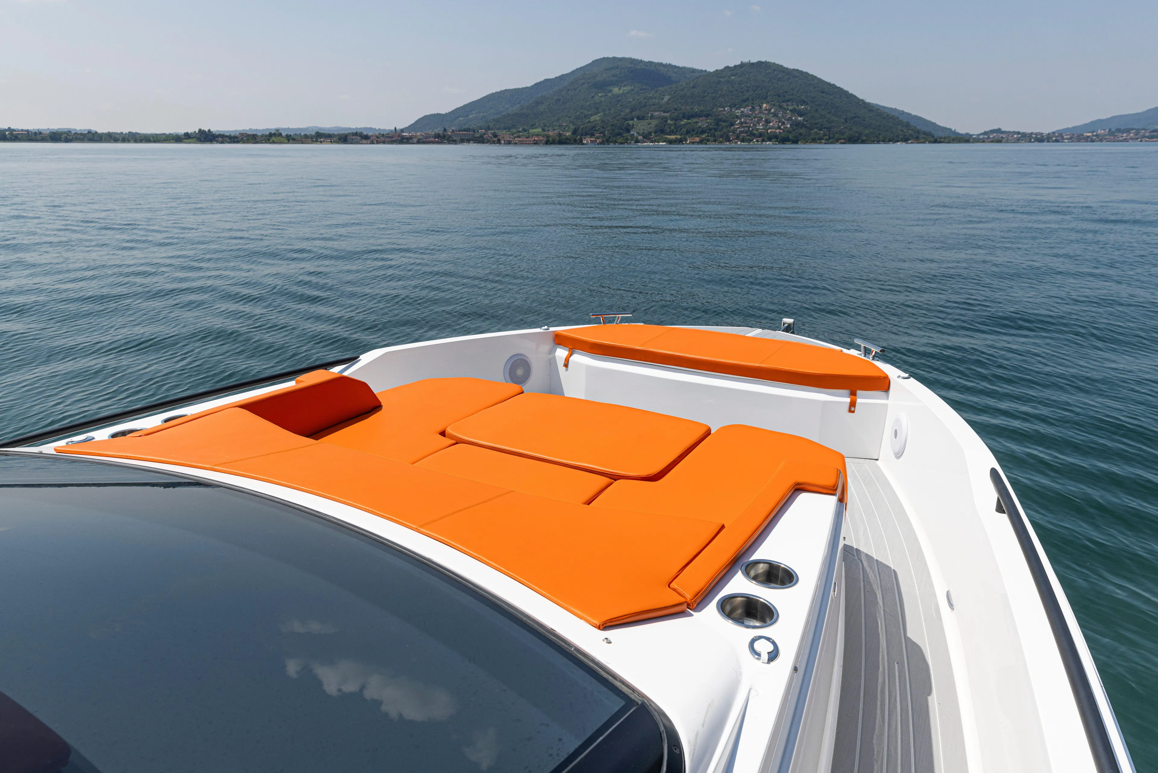  Yacht Photos Pics 2024 Rio Yachts Daytona 35 with vibrant orange seating on calm waters.