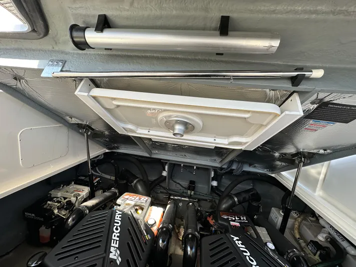  Yacht Photos Pics Engine compartment of a 2004 Sea Ray 340 Sundancer with Mercury engines.