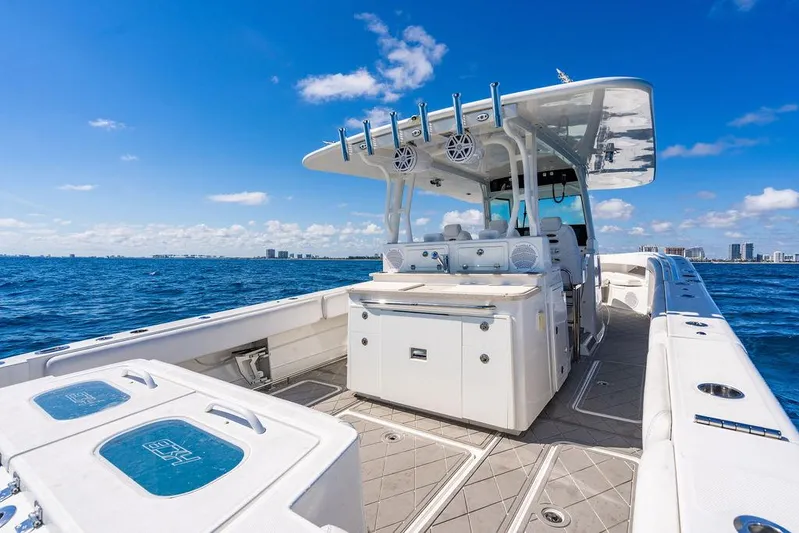 Batavia Yacht Photos Pics 2019 HCB 42 Siesta boat on open water under clear blue sky.