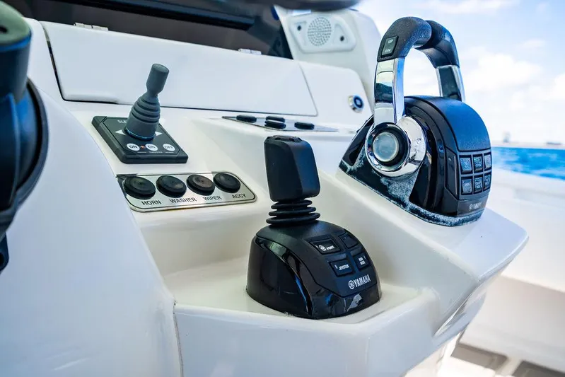 Batavia Yacht Photos Pics Control panel of a 2019 HCB 42 Siesta boat, featuring modern navigation equipment.