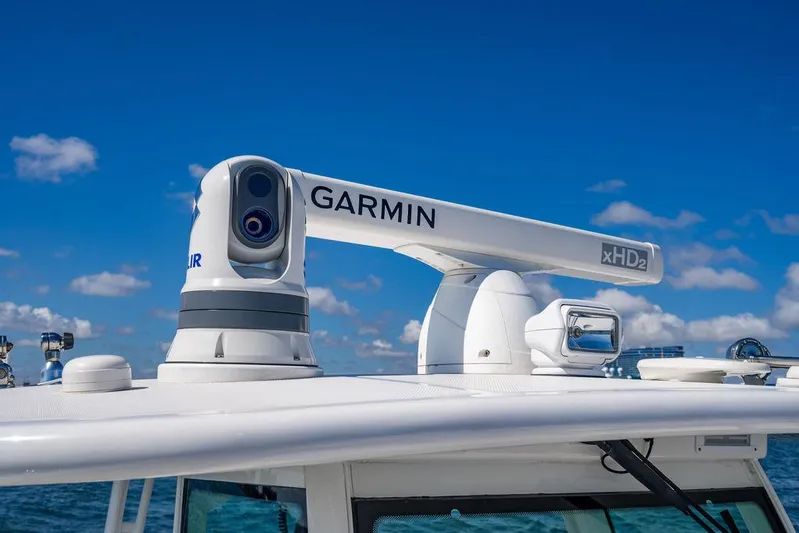 Batavia Yacht Photos Pics 2019 HCB 42 Siesta boat with Garmin xHD2 radar against blue sky.