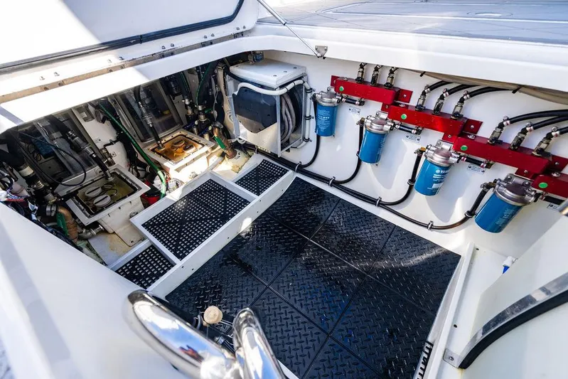 Batavia Yacht Photos Pics Engine room of 2019 HCB 42 Siesta boat, showcasing mechanical components and systems.