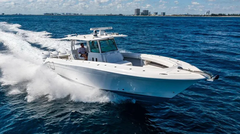 Batavia Yacht Photos Pics 2019 HCB 42 Siesta boat cruising on open water under a clear sky.