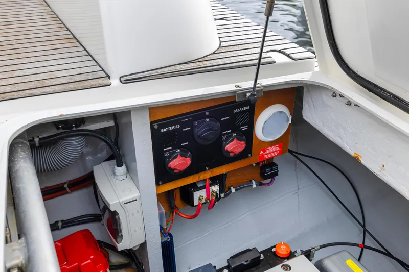 Benedetto Yacht Photos Pics Electrical panel of a 2020 Lagoon 42 catamaran, featuring battery switches and wiring.