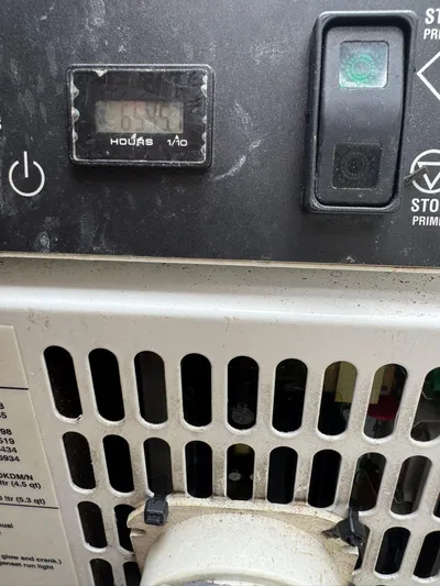 Benedetto Yacht Photos Pics Control panel of a 2020 Lagoon 42, featuring power and hour meter displays.