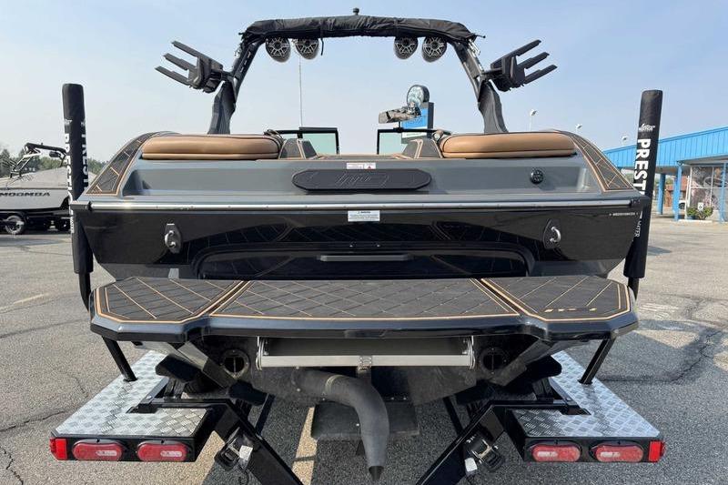 2024 MB Alpha 23 boat rear view, featuring sleek design and modern features.