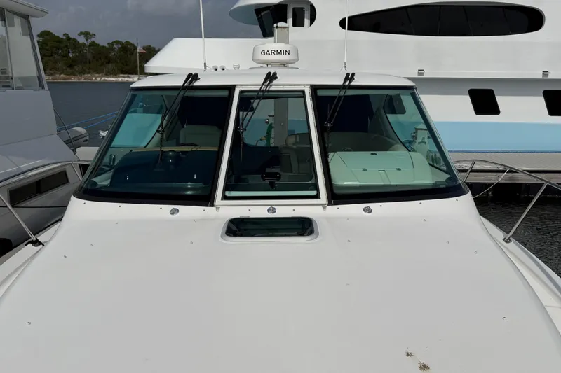  Yacht Photos Pics 2007 Tiara Yachts 3900 Sovran with Garmin equipment, docked near other boats.