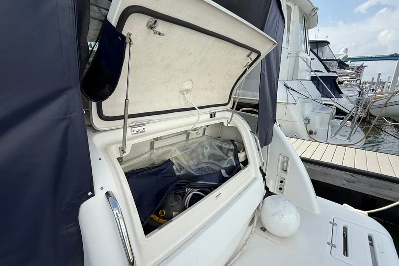  Yacht Photos Pics 2007 Tiara Yachts 3900 Sovran storage compartment open at marina dock.