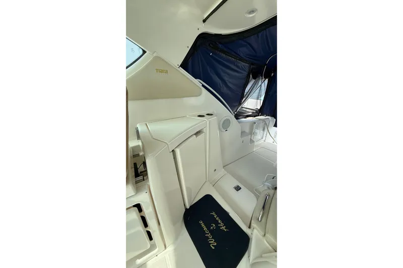  Yacht Photos Pics Interior of 2007 Tiara Yachts 3900 Sovran with seating and "Welcome Aboard" mat.