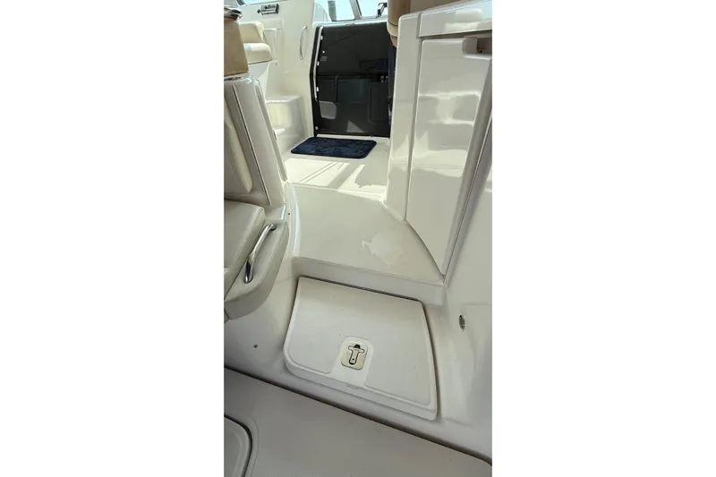  Yacht Photos Pics Interior view of 2007 Tiara Yachts 3900 Sovran, showcasing sleek white seating and flooring.