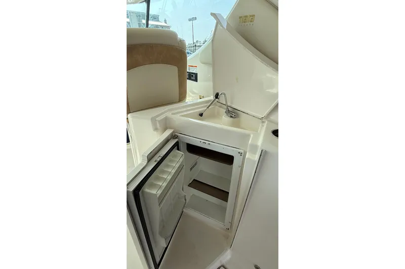  Yacht Photos Pics 2007 Tiara Yachts 3900 Sovran interior with sink and open mini fridge.