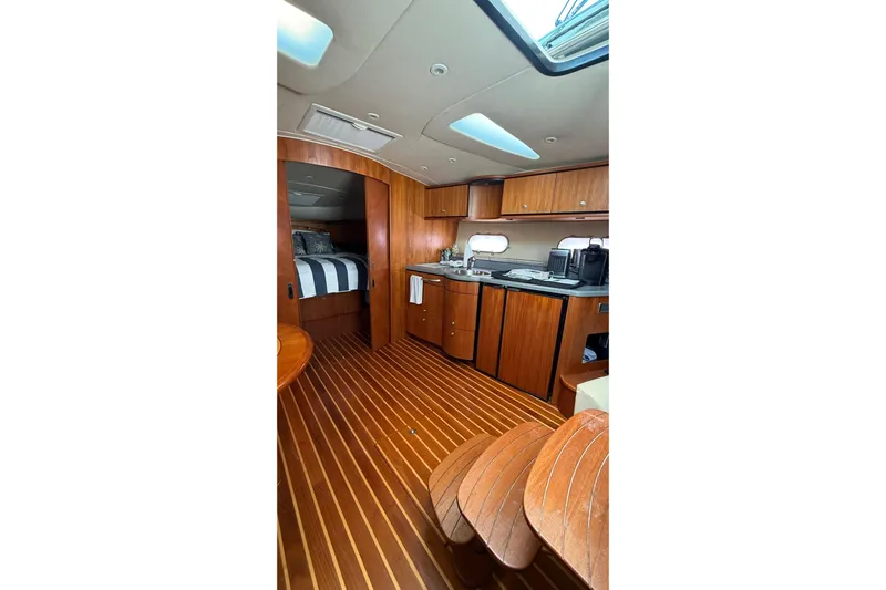  Yacht Photos Pics Interior of 2007 Tiara Yachts 3900 Sovran, featuring wood finishes and modern amenities.