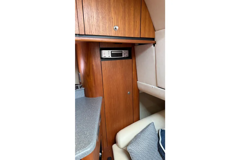  Yacht Photos Pics 2007 Tiara Yachts 3900 Sovran interior with wood cabinetry and modern amenities.