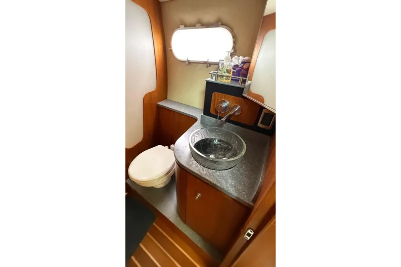  Yacht Photos Pics 2007 Tiara Yachts 3900 Sovran bathroom with modern sink and toilet.