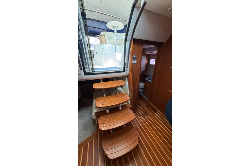  Yacht Photos Pics 2007 Tiara Yachts 3900 Sovran interior with wooden steps and cabin view.