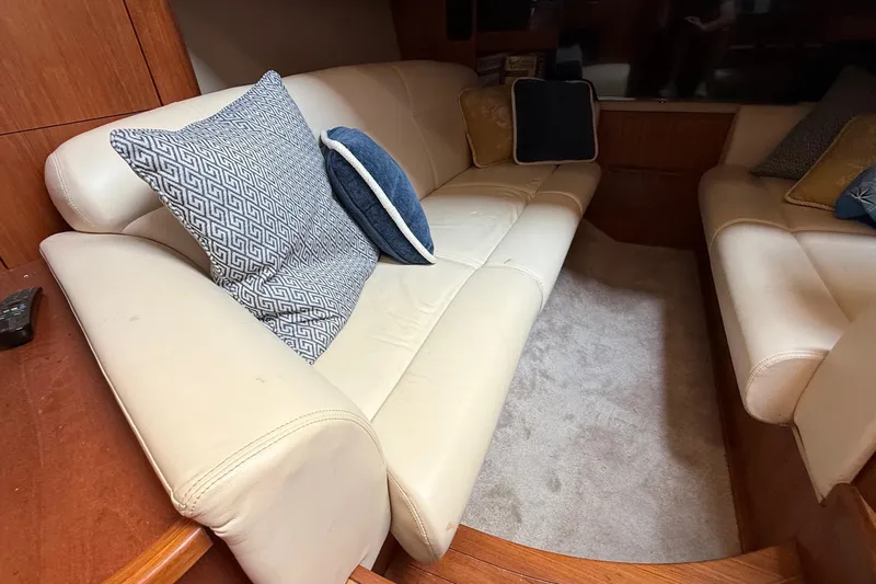  Yacht Photos Pics Luxurious interior of 2007 Tiara Yachts 3900 Sovran with plush seating and decorative pillows.