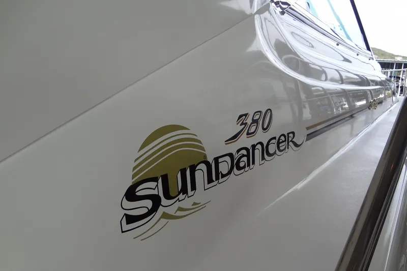 Shel 'b' Gale Yacht Photos Pics 2001 Sea Ray 380 Sundancer boat logo on sleek white hull.