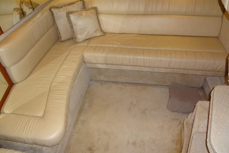 Shel 'b' Gale Yacht Photos Pics Luxurious beige leather seating in 2001 Sea Ray 380 Sundancer yacht interior.