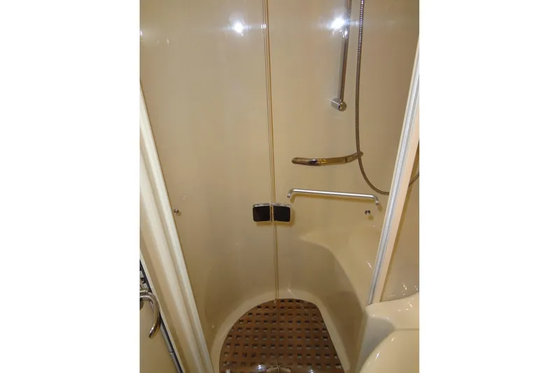Shel 'b' Gale Yacht Photos Pics Shower area in 2001 Sea Ray 380 Sundancer yacht, featuring sleek design and modern fixtures.
