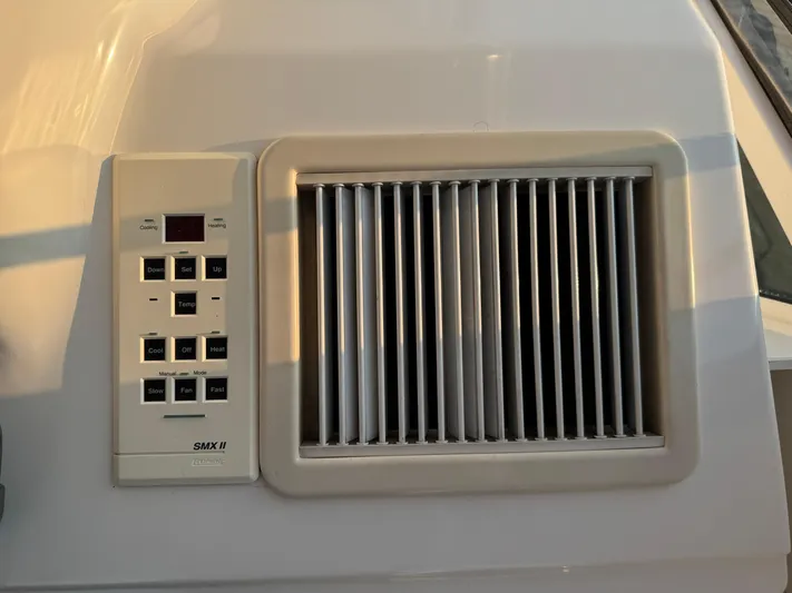 My Satin Doll Yacht Photos Pics Air conditioning control panel on 2001 Sea Ray 480 Sedan Bridge yacht.