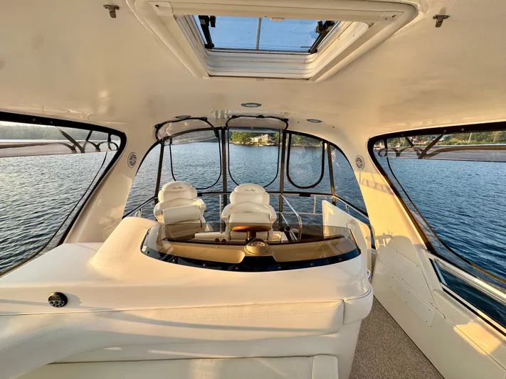 My Satin Doll Yacht Photos Pics Interior of 2001 Sea Ray 480 Sedan Bridge yacht with panoramic water views.