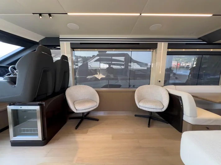  Yacht Photos Pics Luxurious interior of 2022 Absolute 60 Fly yacht with modern seating and sleek design.