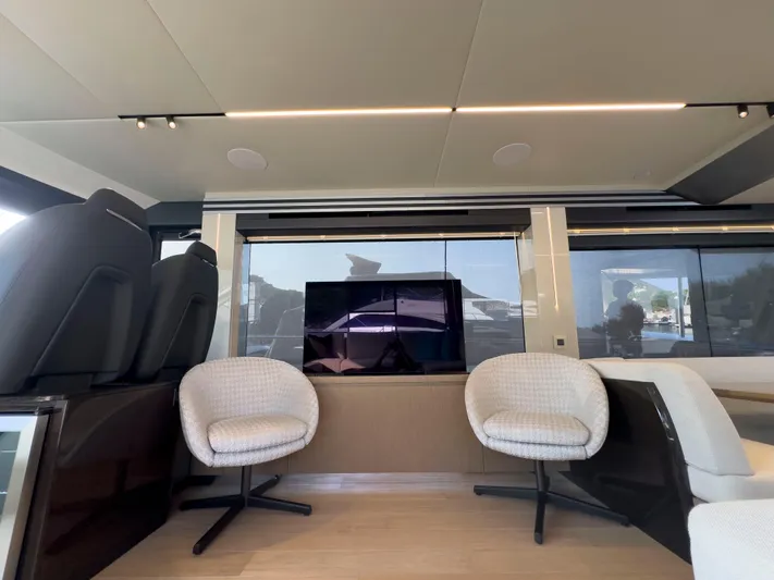  Yacht Photos Pics Interior of 2022 Absolute 60 Fly yacht with modern seating and sleek design.