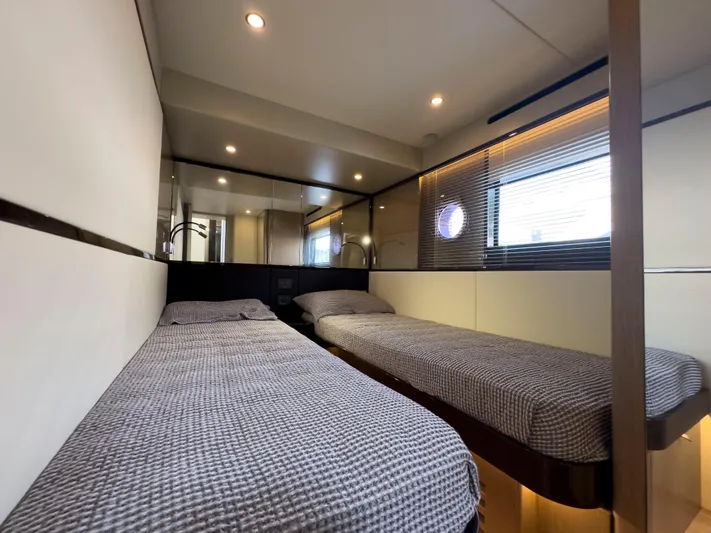  Yacht Photos Pics Interior of 2022 Absolute 60 Fly yacht with twin beds and modern design.