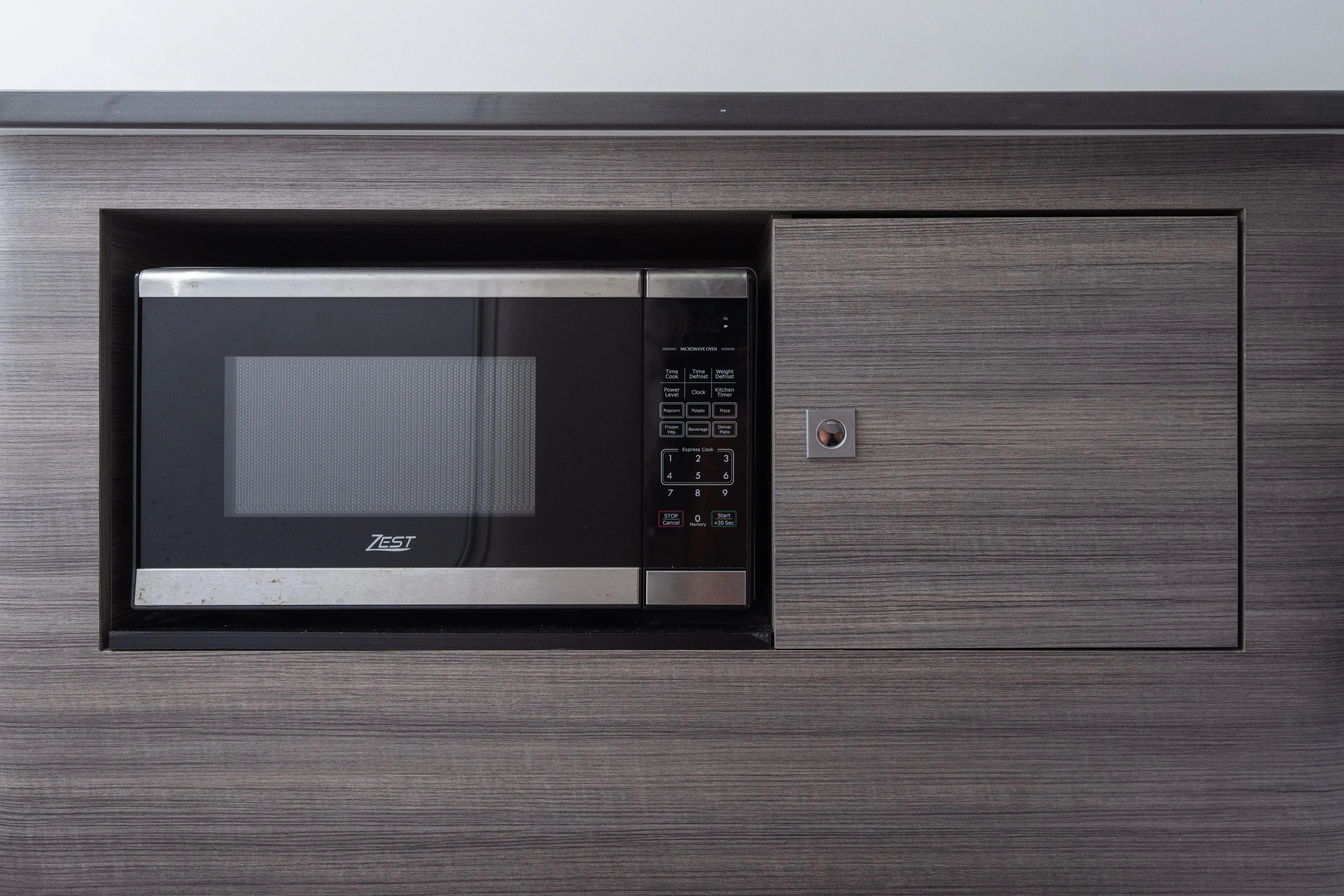 Pellicano Yacht Photos Pics Built-in microwave in 2023 Aviara AV36 OB boat interior.