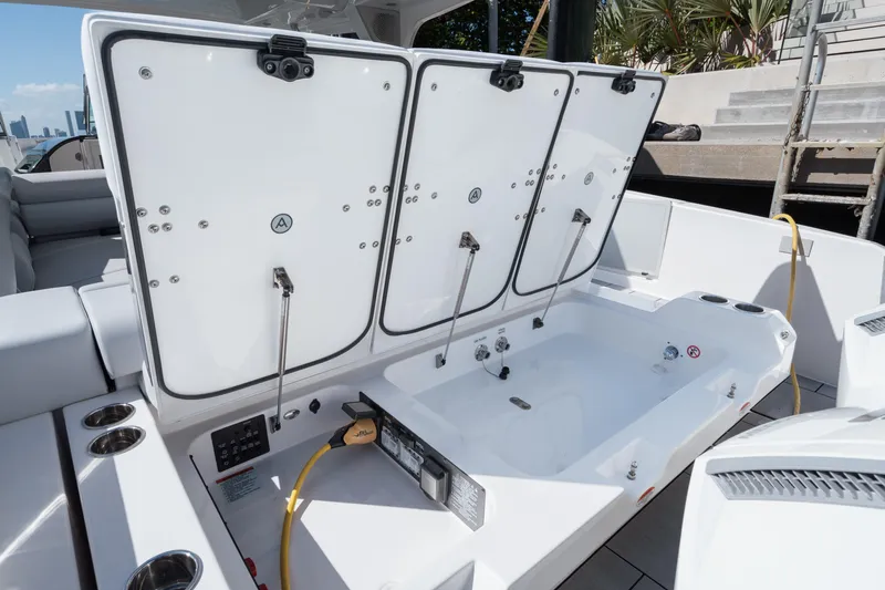 Pellicano Yacht Photos Pics 2023 Aviara AV36 OB boat storage compartments open on deck.