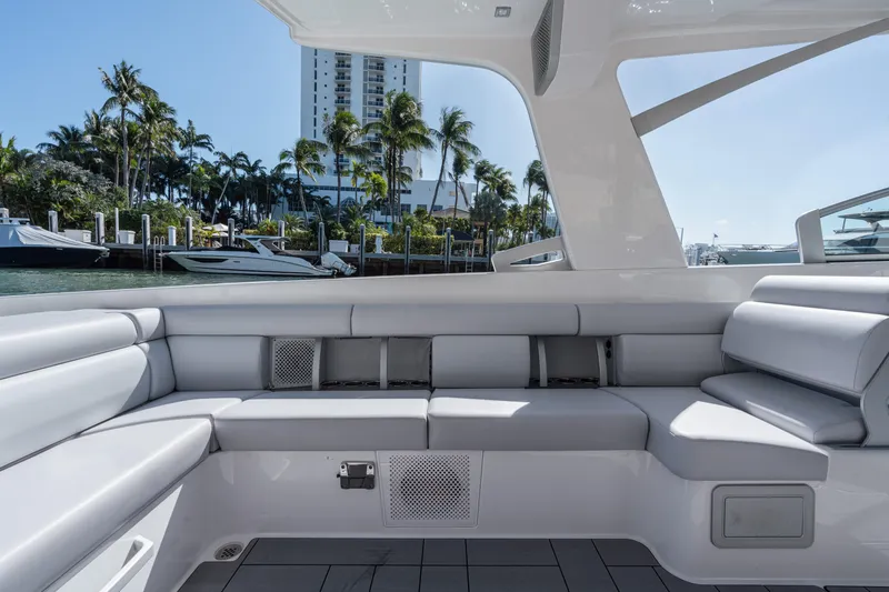 Pellicano Yacht Photos Pics 2023 Aviara AV36 OB luxury boat interior with sleek seating and waterfront view.
