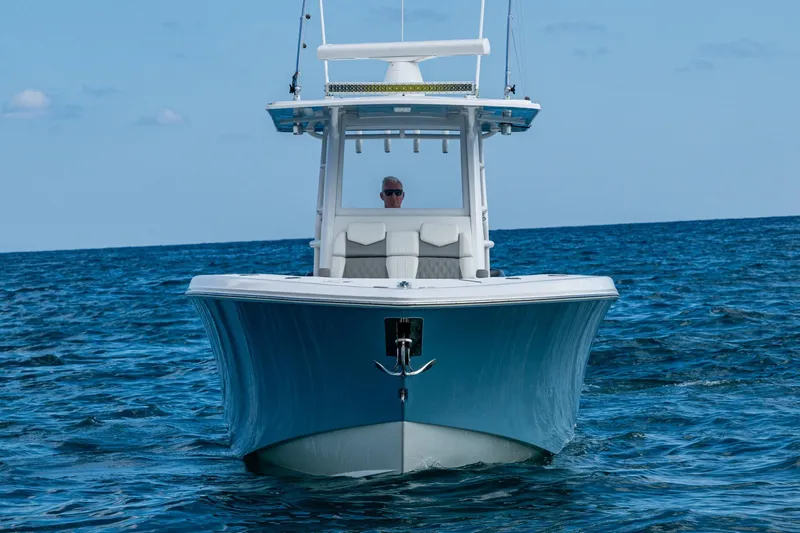  Yacht Photos Pics 2023 Invincible 36 Open Fisherman boat on open sea, front view.
