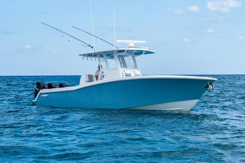  Yacht Photos Pics 2023 Invincible 36 Open Fisherman boat on open ocean waters.