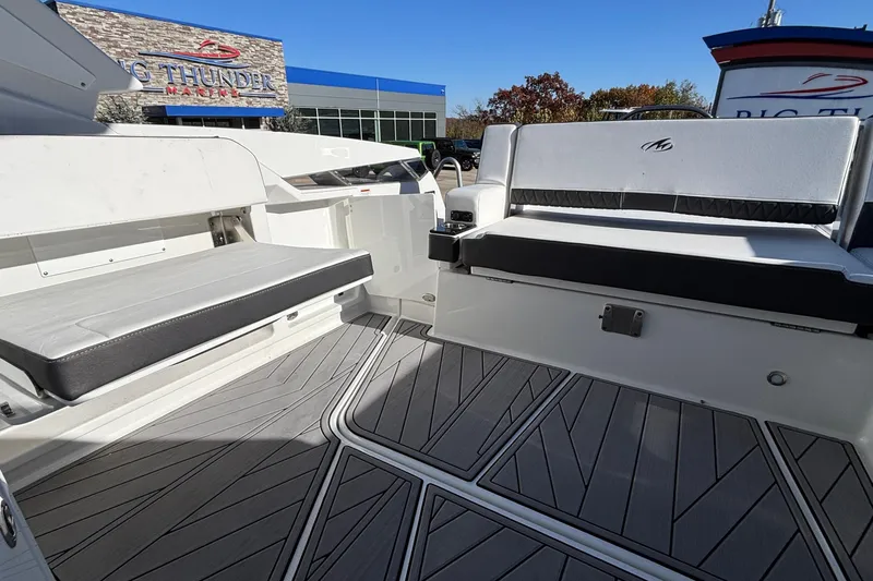  Yacht Photos Pics 2023 Monterey 385SS Super Sport boat interior with sleek seating and modern flooring.