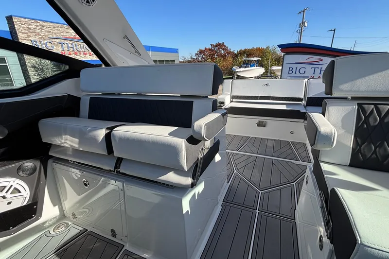  Yacht Photos Pics 2023 Monterey 385SS Super Sport boat interior with modern seating and sleek design.