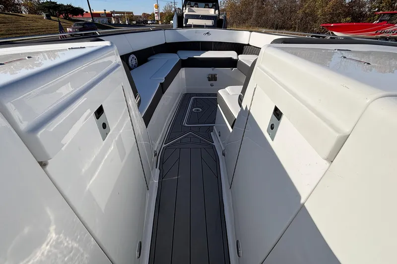  Yacht Photos Pics 2023 Monterey 385SS Super Sport boat interior with sleek seating and modern design.