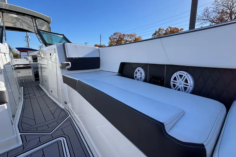  Yacht Photos Pics 2023 Monterey 385SS Super Sport boat interior with sleek seating and modern design.