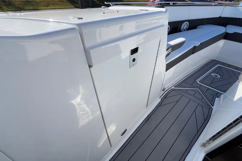  Yacht Photos Pics 2023 Monterey 385SS Super Sport boat interior with sleek seating and modern flooring.