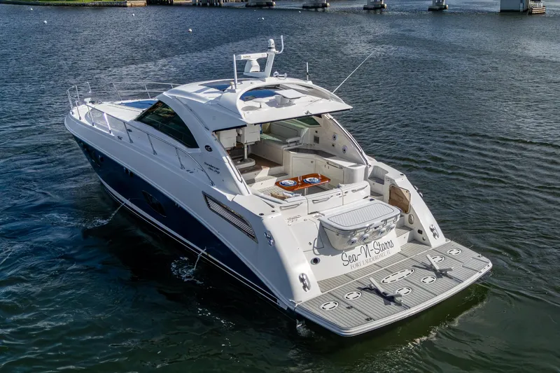 Sea N Starrs Yacht Photos Pics 2012 Sea Ray 540 Sundancer yacht cruising on open water.