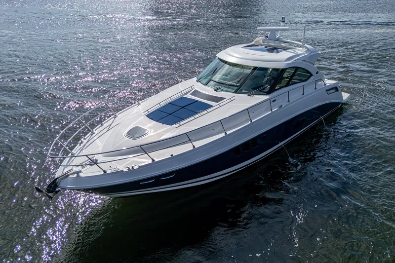 Sea N Starrs Yacht Photos Pics 2012 Sea Ray 540 Sundancer yacht cruising on open water.