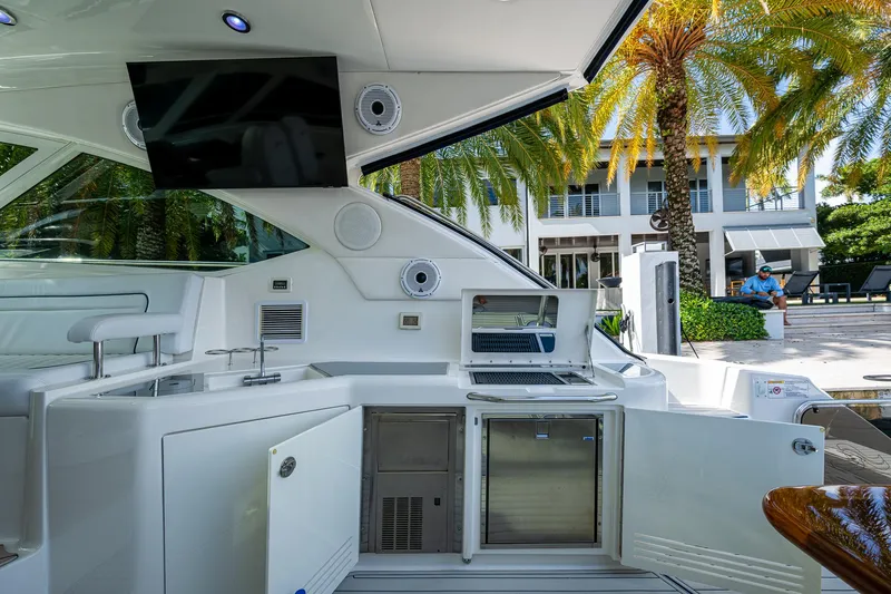 Sea N Starrs Yacht Photos Pics 2012 Sea Ray 540 Sundancer yacht interior with modern amenities and outdoor view.