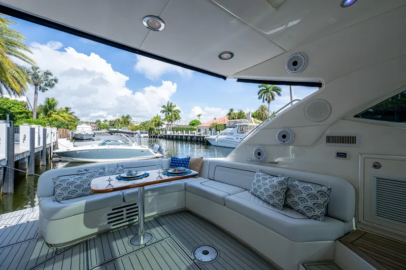 Sea N Starrs Yacht Photos Pics Luxurious 2012 Sea Ray 540 Sundancer yacht interior with elegant seating and scenic marina view.