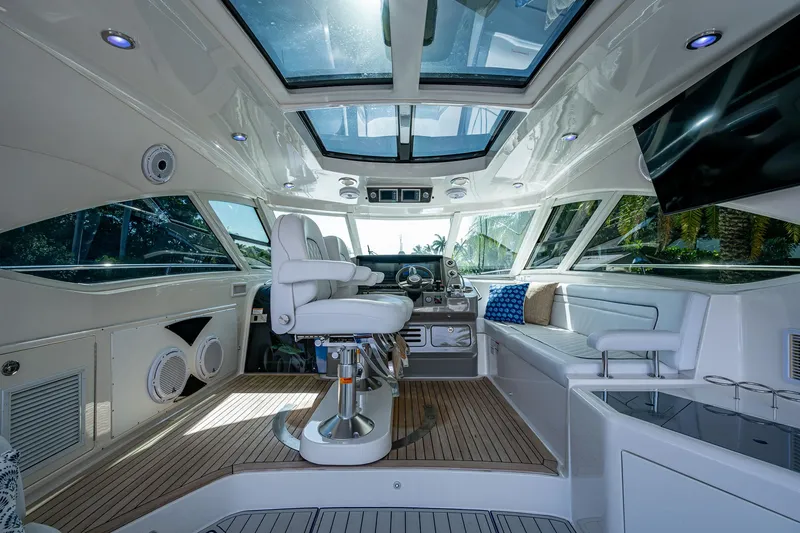 Sea N Starrs Yacht Photos Pics Luxurious interior of 2012 Sea Ray 540 Sundancer yacht with plush seating and modern helm.