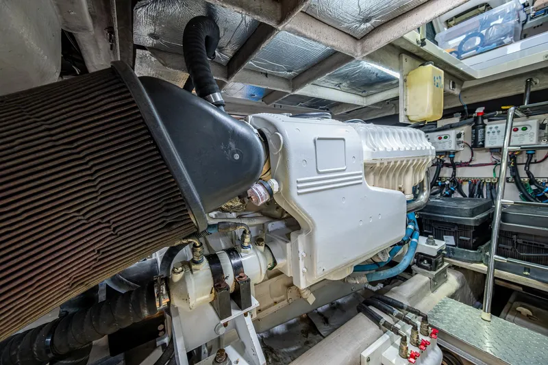 Sea N Starrs Yacht Photos Pics Engine room of 2012 Sea Ray 540 Sundancer yacht, showcasing detailed machinery and components.