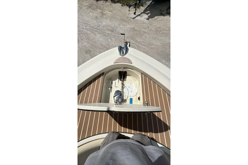  Yacht Photos Pics 2015 Chris-Craft Catalina 29 boat deck with open hatch, viewed from above.